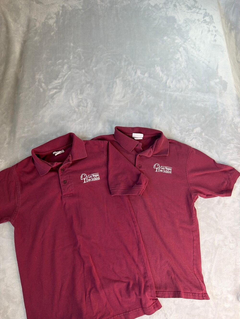 Las Vegas day school youth large maroon polos